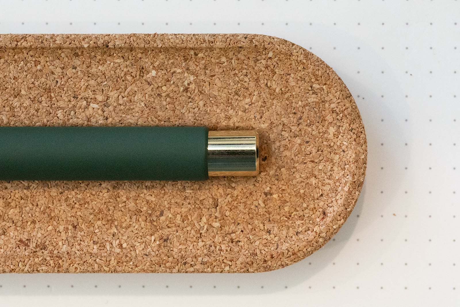 A mark one on a cork pen tray.