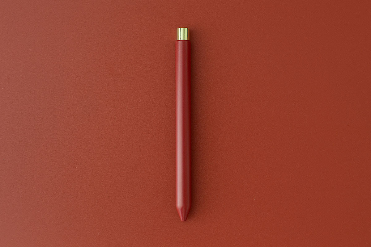 A red and gold Mark One on red.